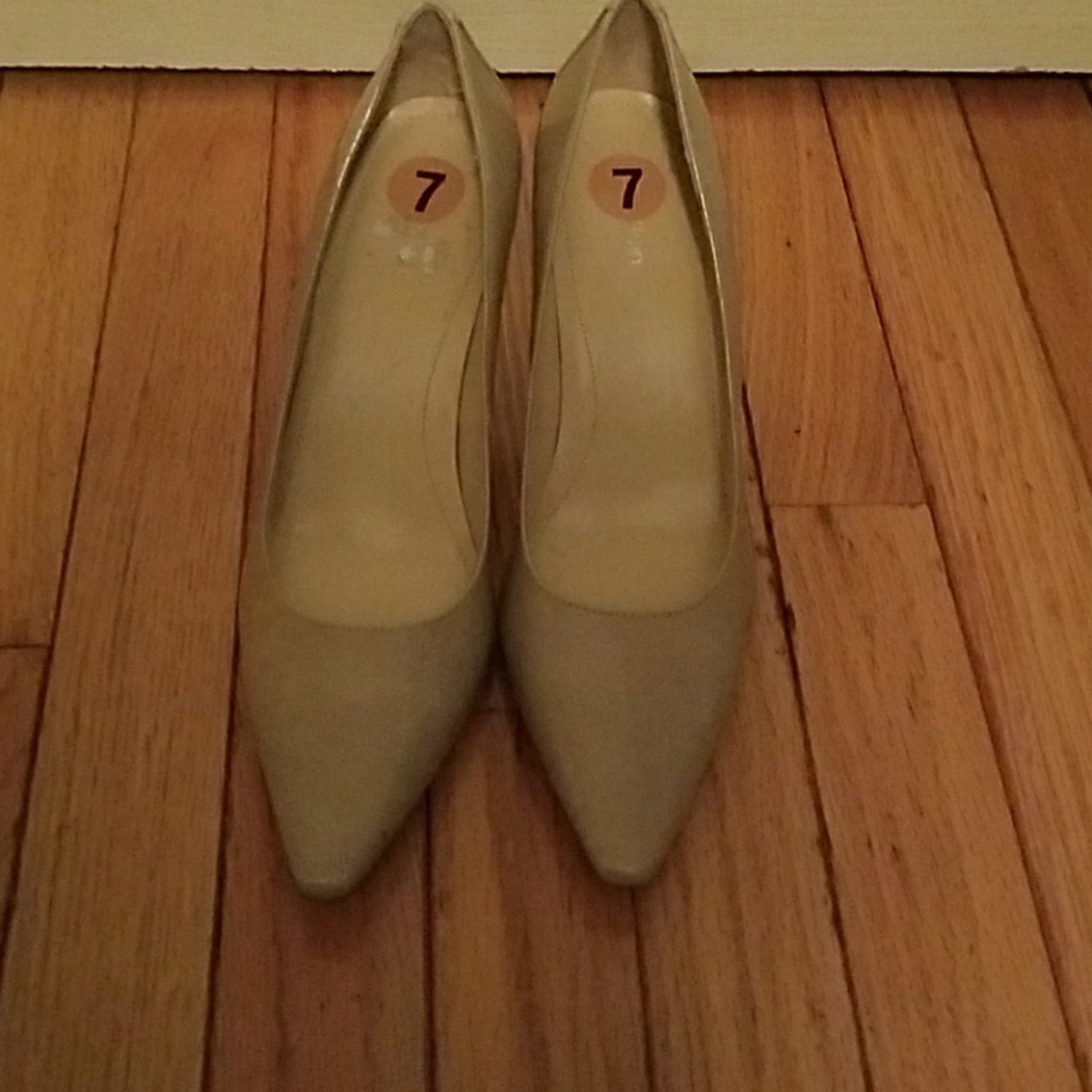 Tan Calvin Klein pumps